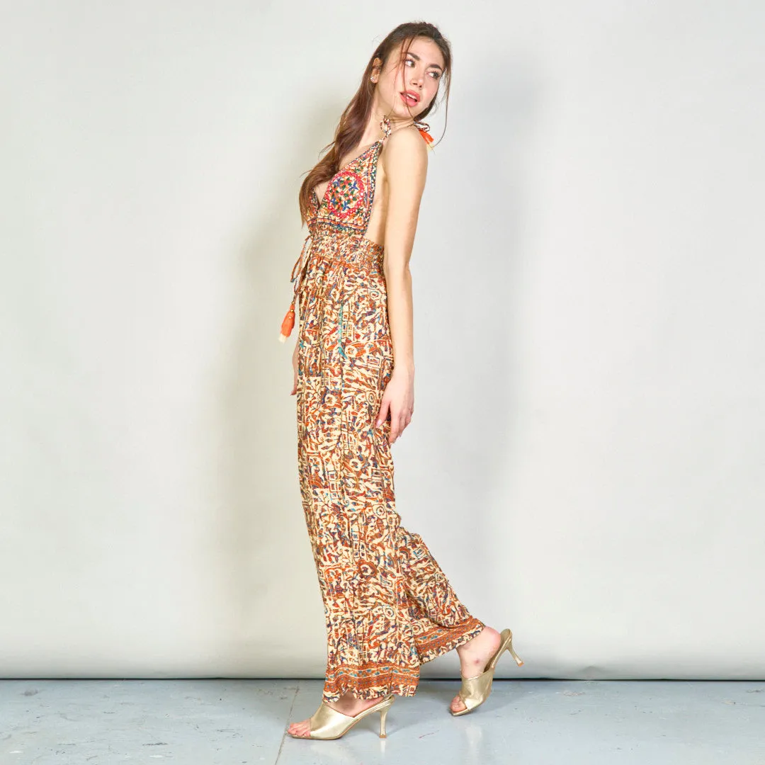 Embroidered boho jumpsuit with tassel accents wholesale