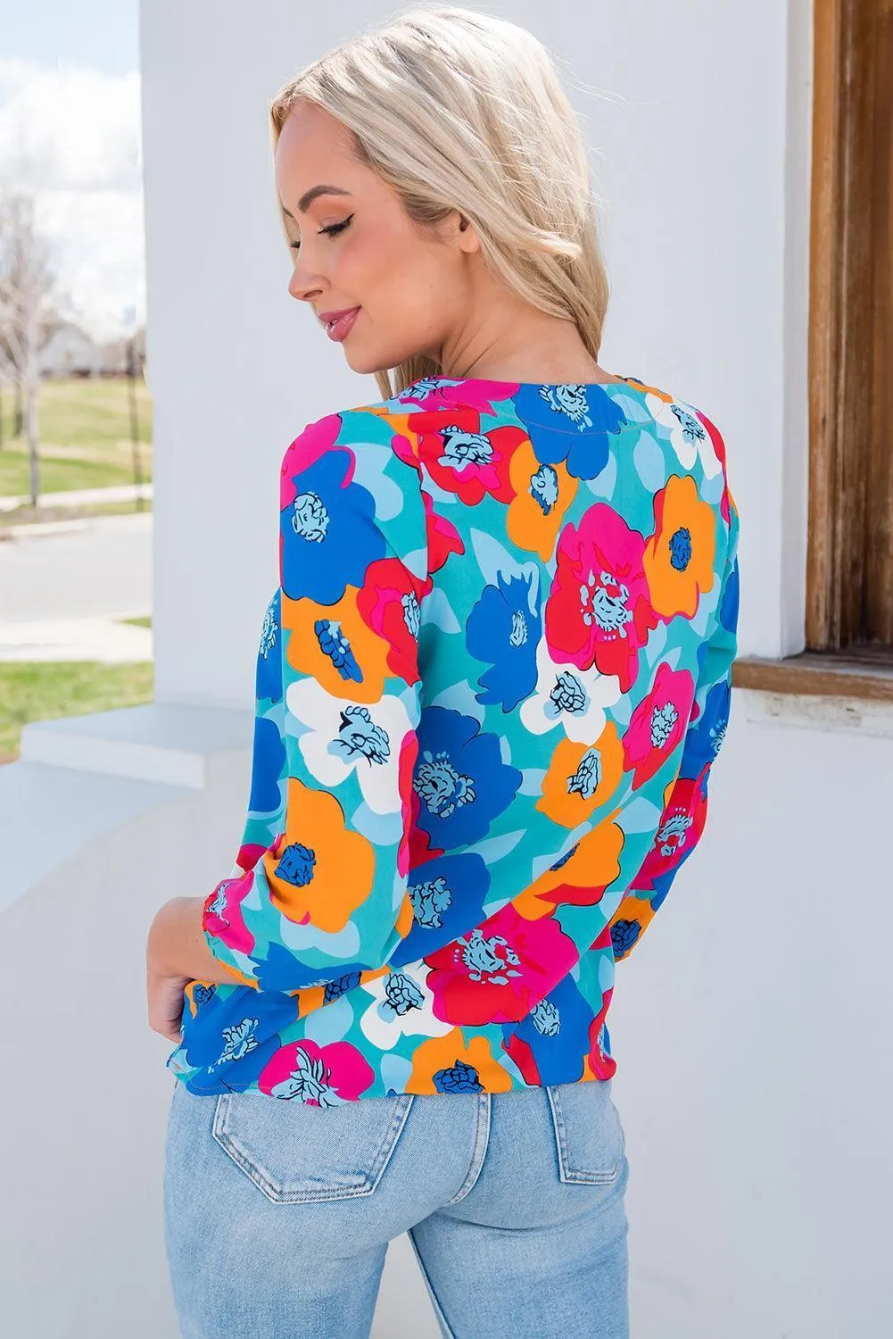 Vibrant Three-Quarter Sleeve Floral V Neck Top