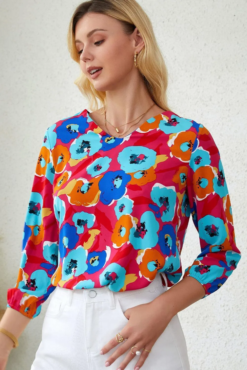 Vibrant Three-Quarter Sleeve Floral V Neck Top
