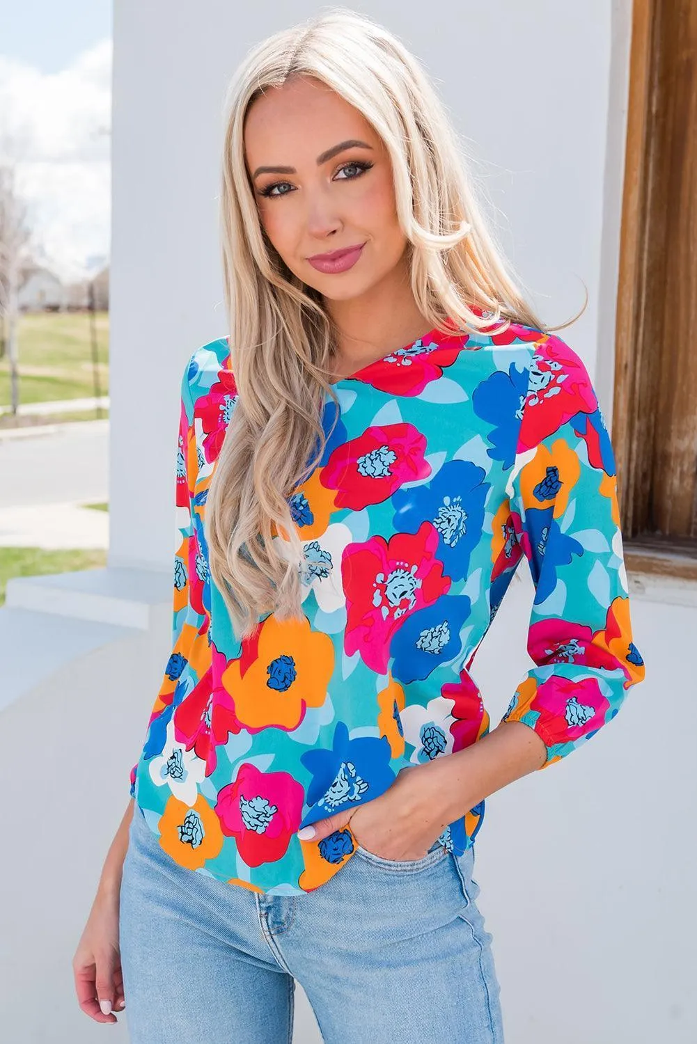 Vibrant Three-Quarter Sleeve Floral V Neck Top