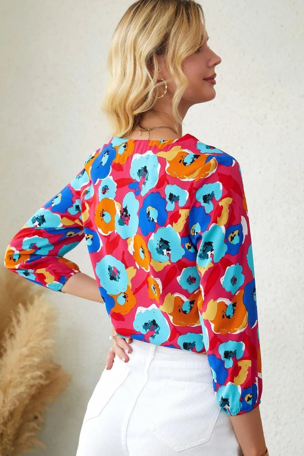 Vibrant Three-Quarter Sleeve Floral V Neck Top